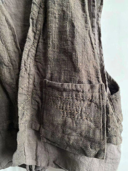 Gilet en lin à poches superposées